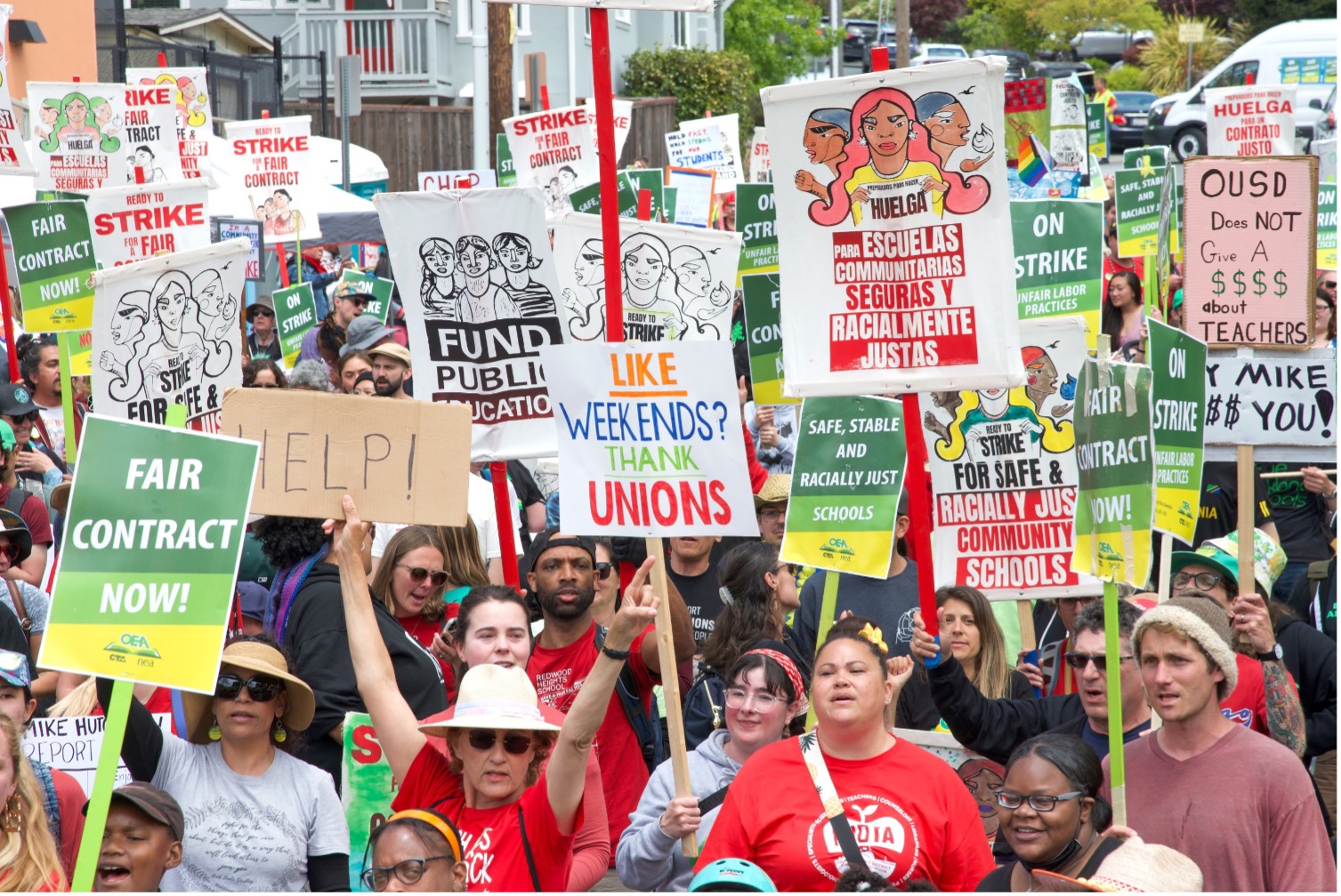 People march with picket signs during the 2023 Oakland Education Association strike.
